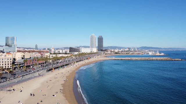sailing along Barcelona coastline